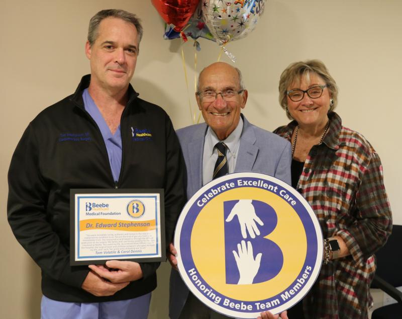 Tom Volatile and Carol Dennis celebrate the excellent care Tom received from Dr. Edward Stephenson, left. SUBMITTED PHOTO